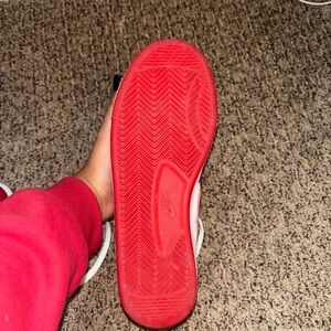Nike Sneakers with Red Sole